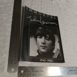 No4 : Eleven  (11) laminated in plastic posters featuring the Beatles